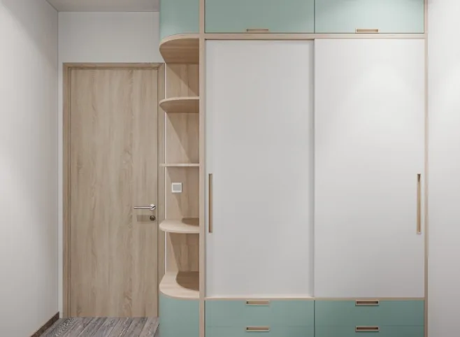 Armario empotrado con puertas correderas blancas y verde menta en Burgos